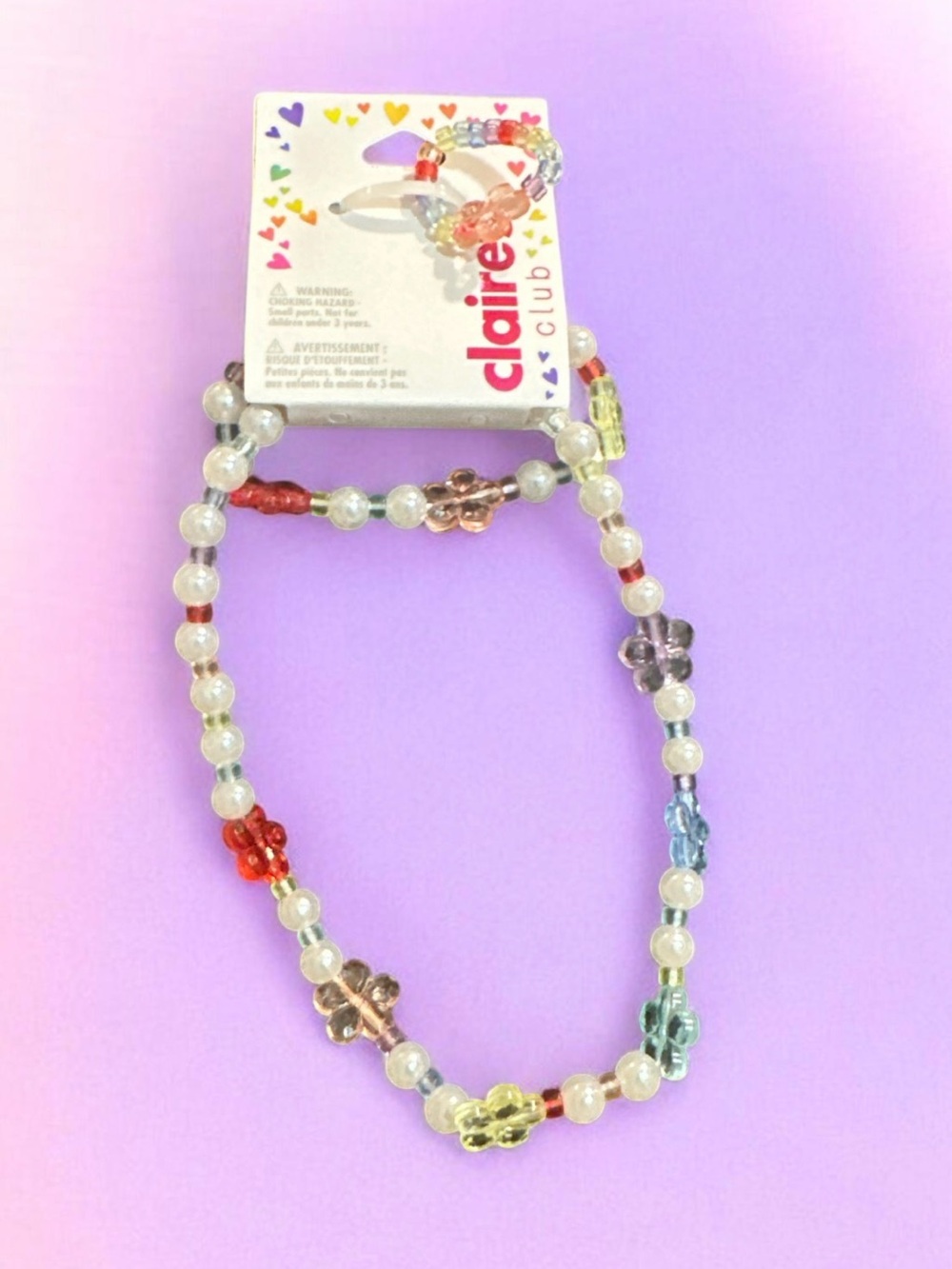 Claire's Pearl Bead Necklace with Multicolor Flower Charms
1058